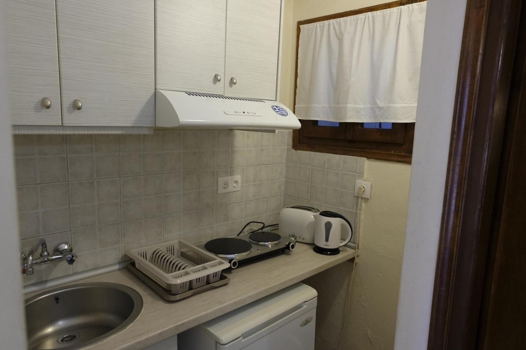 העיירה סקיאתוס Taxiarchis Apartments חדר תמונה